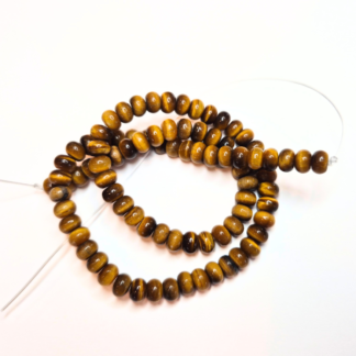 En sträng tigeröga-pärlor 6,5x4 mm  (ca 88 pärlor) (82259)