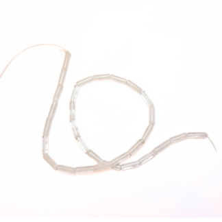 en sträng bergskristall  12-13x4-4,5 mm (ca 31 pärlor)  (82260)