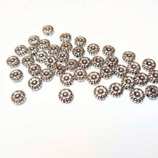 Metallpärlor blommor 20 st. 7,5x3,5 mm (82279)