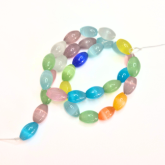 1 sträng ovala cat eye glaspärlor 12x8mm (ca 33 pärlor) (82286)