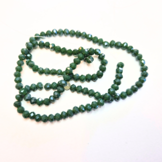 En sträng glaspärlor fasetterade 4x3 mm  (ca 120 st) (82299)