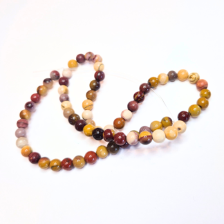 En sträng mookait-pärlor 6 mm (ca 61 pärlor) (82307)